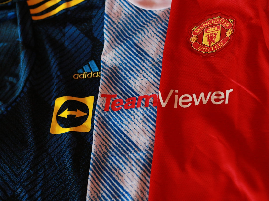 a pair of blue and red striped shirts with white text
